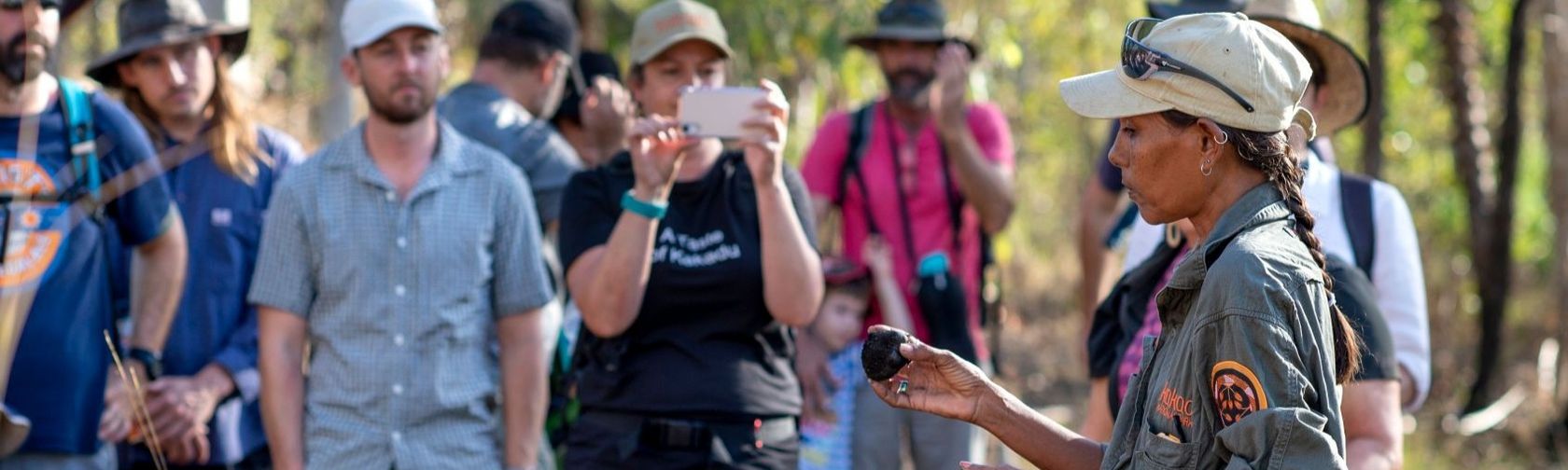 A ranger giving a talk to a tour group