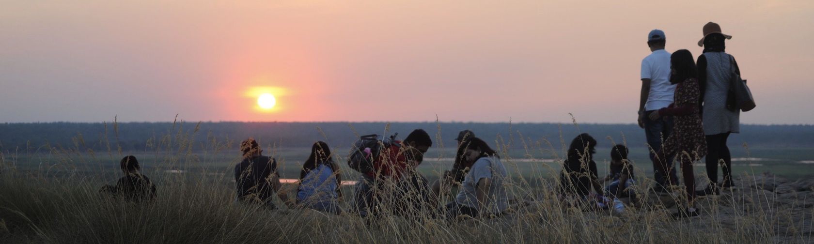 Visitors on a Never Never Tours Ubirr Sundowner tour. Photo: Wildman Chizo