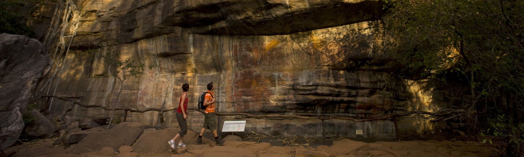 Visitors viewing rock art at Ubirr. Photo: Peter Eve